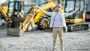A man standing infront of the excavator