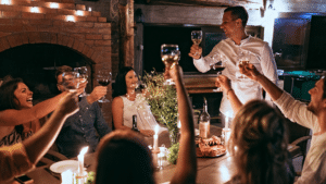 Group of people having wine toast together