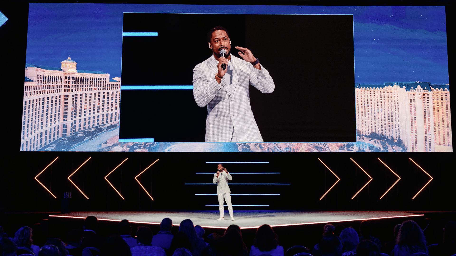 Los Angeles Corporate Event Emcee is onstage and on screen for Hilton Corporate Conference