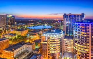 Orlando Florida Tall Buildings full of lights and a Lake