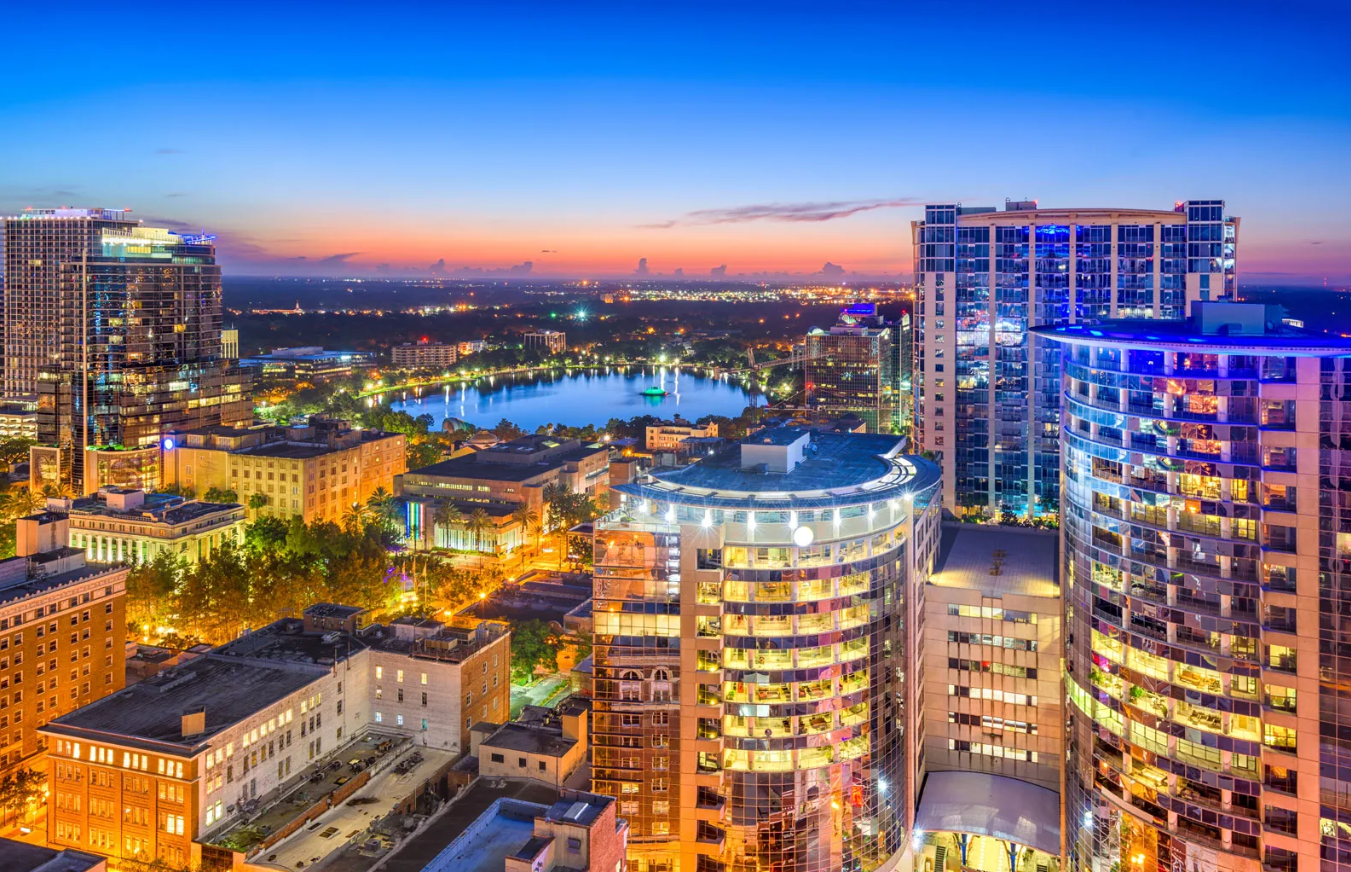 Orlando Florida Tall Buildings full of lights and a Lake