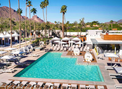Sunloungers, Pools and Palm Trees