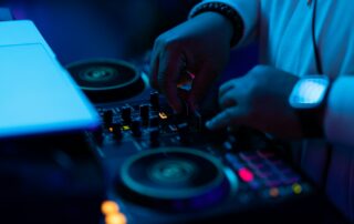 DJ mixer and hands