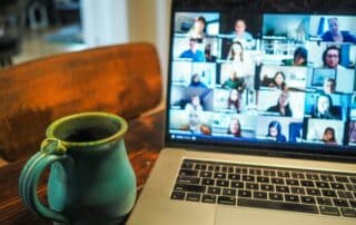 Laptop and mug during virtual event