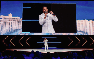 Hamilton Corporate Event Emcee is onstage and on screen for Hilton Corporate Conference