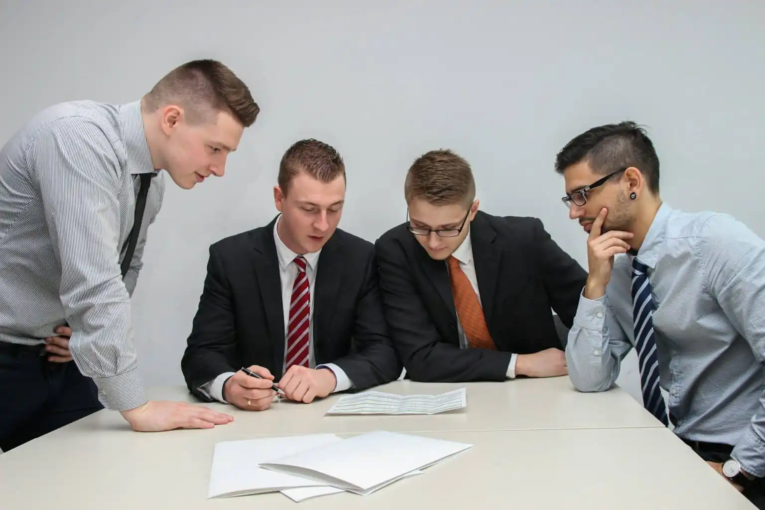 Sales leadership reviewing the causal mechanisms that connect sales kickoff investment to Q1 revenue outcomes