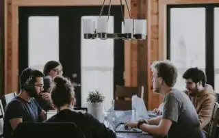 Meeting about sales kickoff music