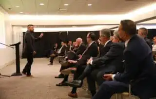 People Discussing A List of Fun Sales Kickoff Ideas