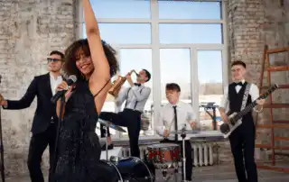 A corporate band consist of 5 people playing their instruments