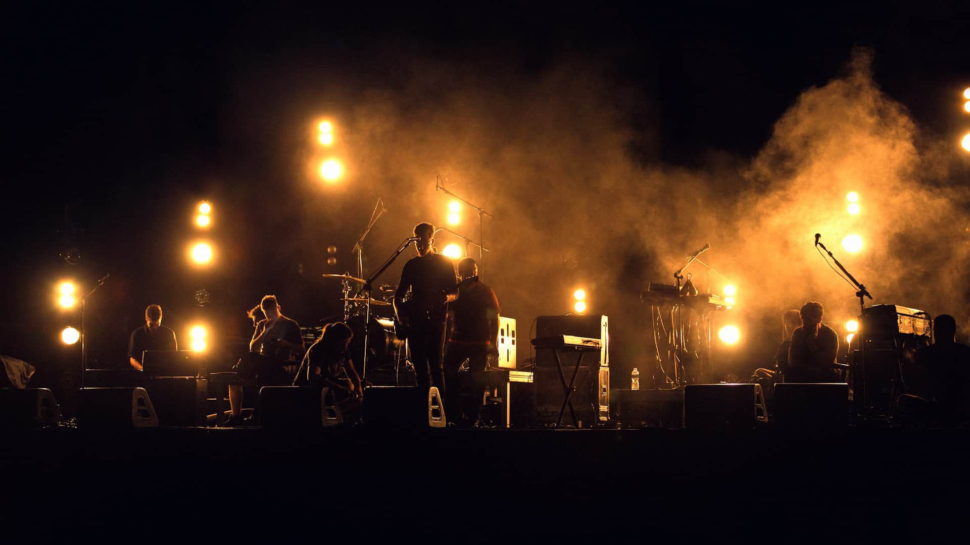A corporate band performing on stage