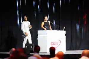 Miami Corporate Event DJ Will Gill onstage teaching CDW President Chris Leahy how to DJ