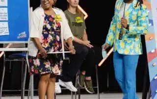 Corporate Emcee Will Gill engaging a lively audience at an event