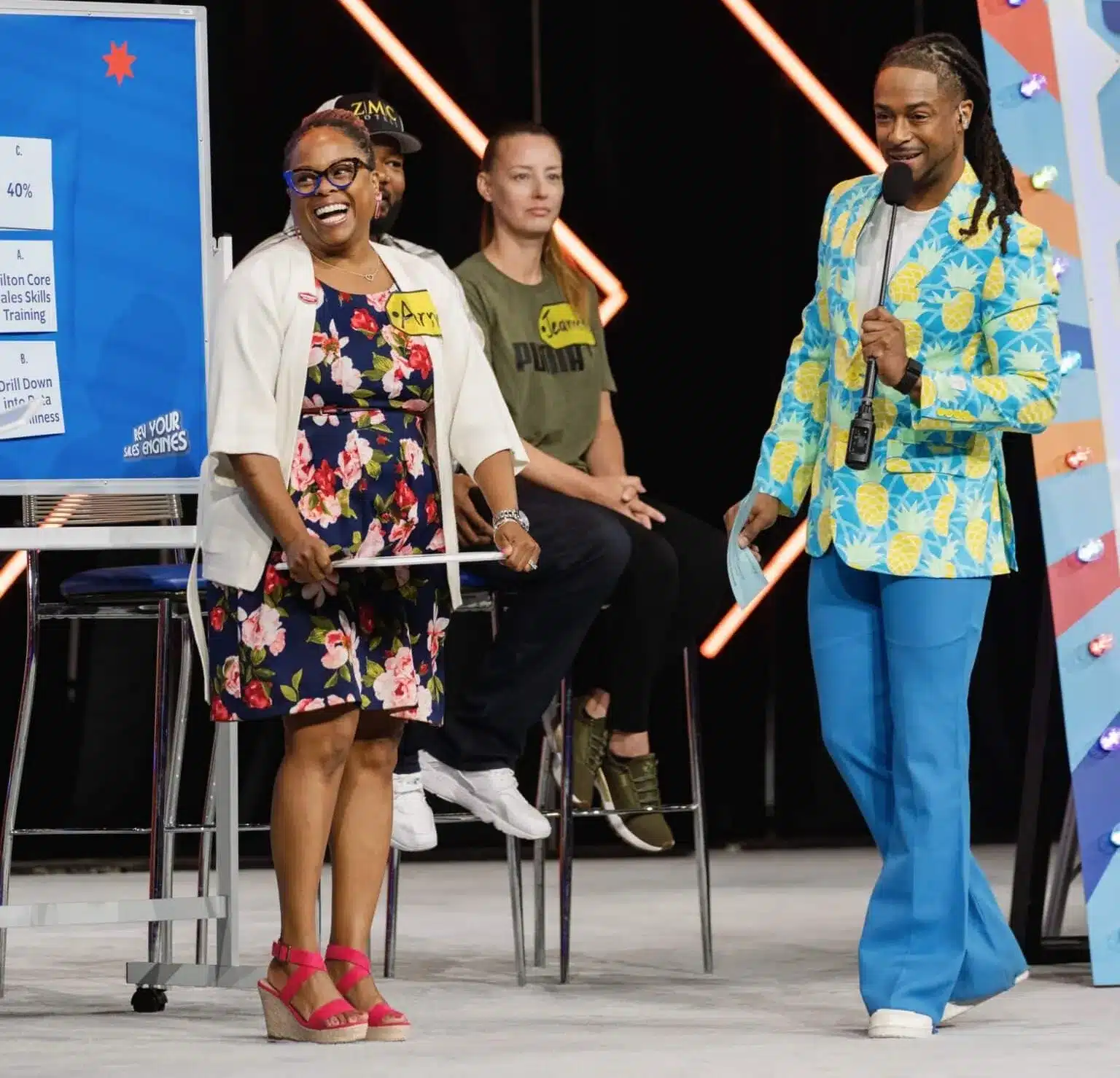 Corporate Emcee Will Gill engaging a lively audience at an event