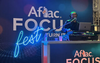 Corporate event DJ Will Gill performing at an Aflac event