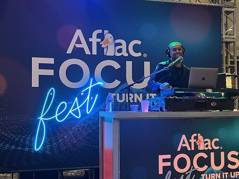 Corporate event DJ Will Gill performing at an Aflac event