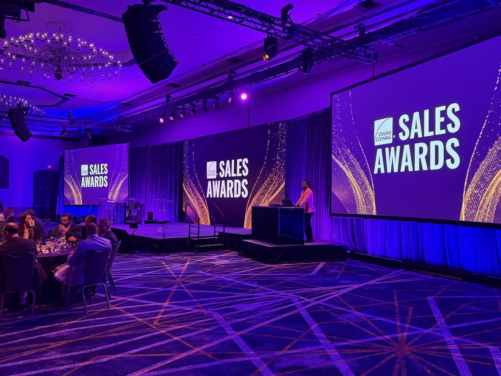 Will Gill hosting a corporate sales awards night on stage in Jacksonville, Florida